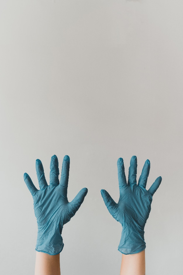 blue gloved hands